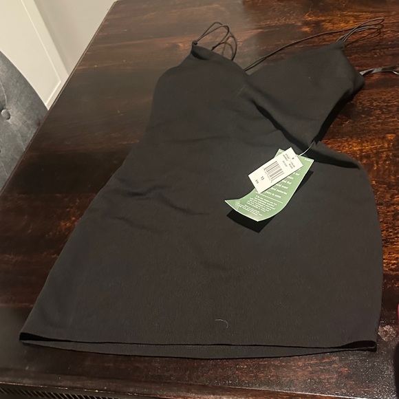 B. Smart Dresses & Skirts - B. Smart short black dress with strappy back. Fun night out or homecoming dress